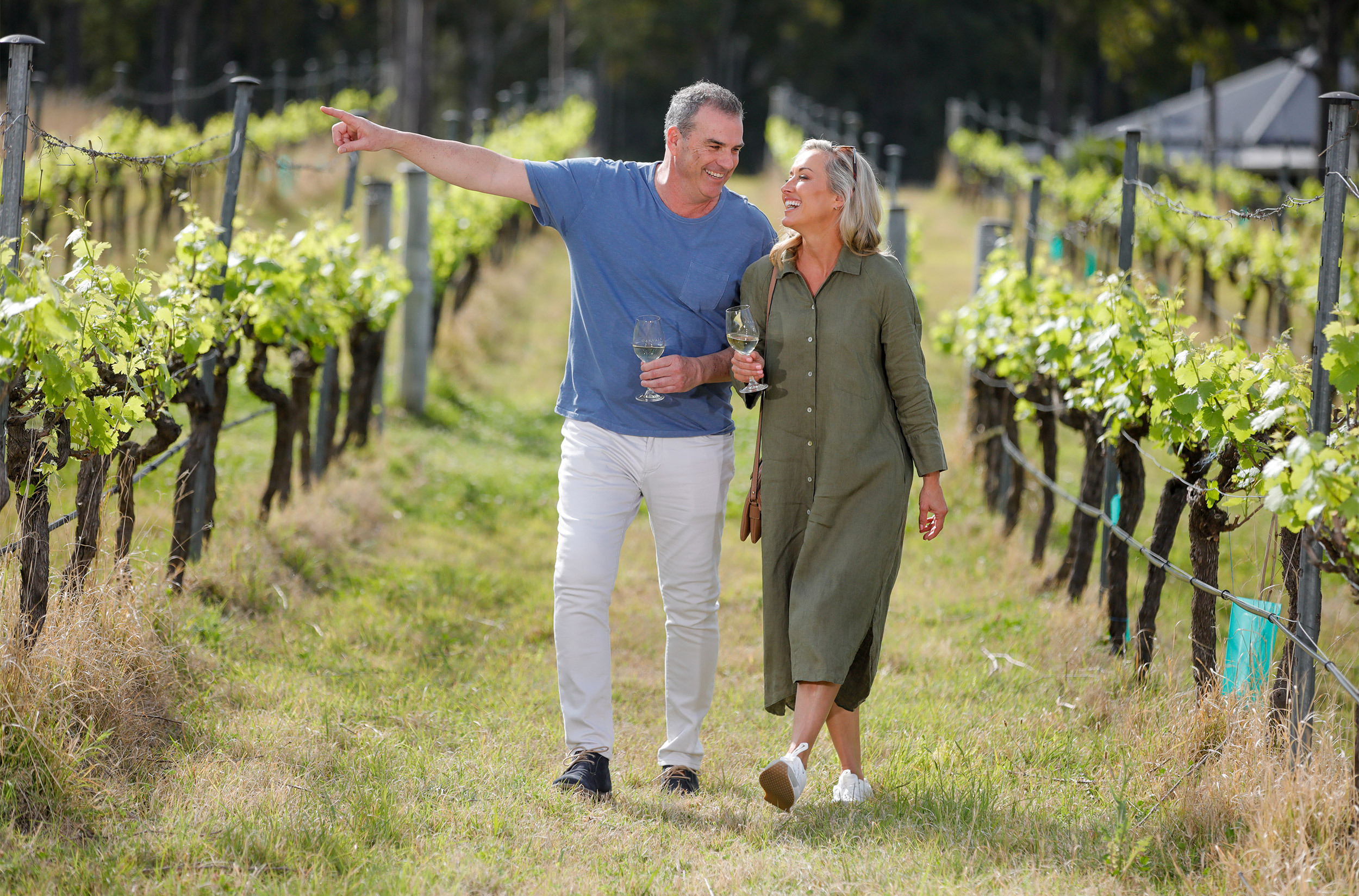 Couple Walking through winery2500x1650